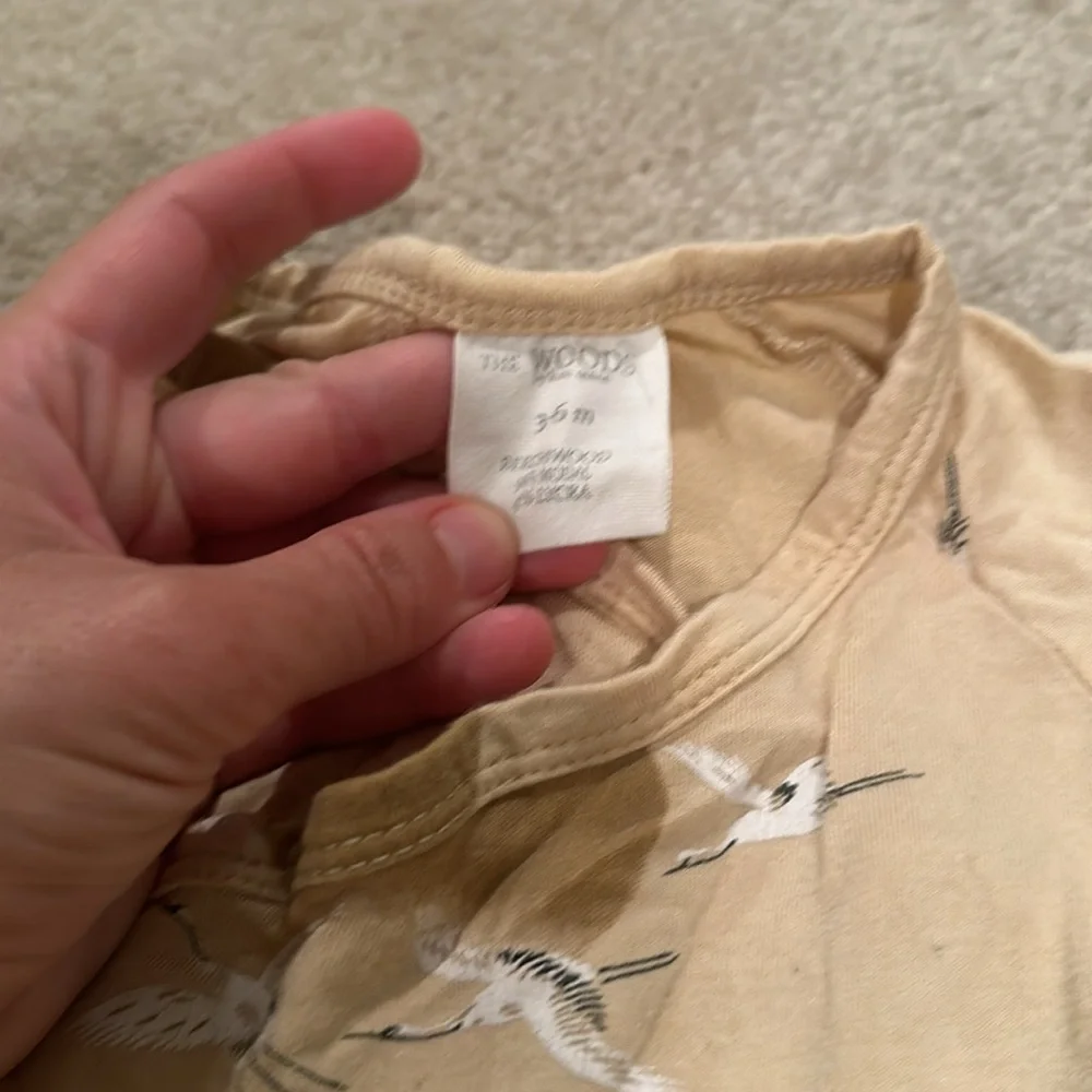 Kate Quinn bird bodysuit